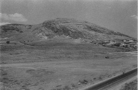 Mt Pontinos and the area of the Geometric cemetery from the south-east, with houses of Myloi and the road/railway.