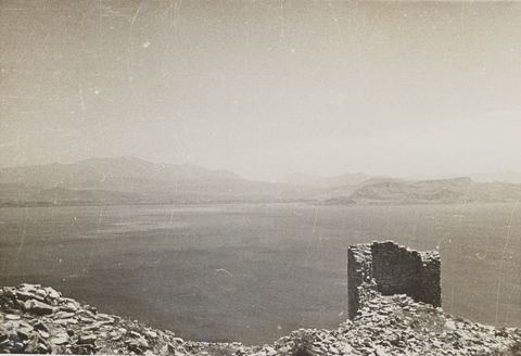 Ruined tower of the Pontinos castle looking east across the gulf to Nafplio and the Palamidi.