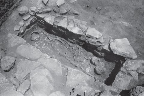 Lerna excavation: a built cist grave (c. 1700 BC).