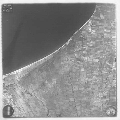 Strip-flight aerial photo of the coastal plain and shore at the head of the Argolic Gulf near Myloi.