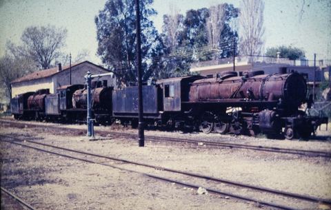 Graveyard of withdrawn metre-gauge steam locomotives at Myloi station.