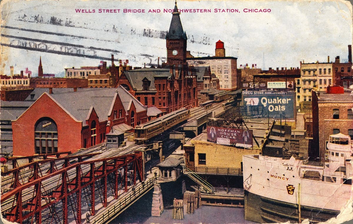 The Wells Street bridge in Chicago with the freighter Muncy at the quay, around 1909. Angelos Kouvalis lived a few blocks north of here, at 417 N. Wells Street.