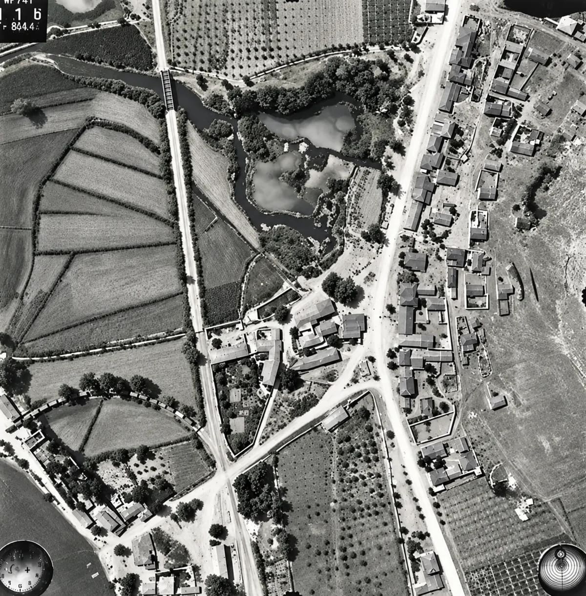 Aerial photograph of Myloi from 13 July 1941: village, fields and coast seen from about 1,000 metres (digitally restored)