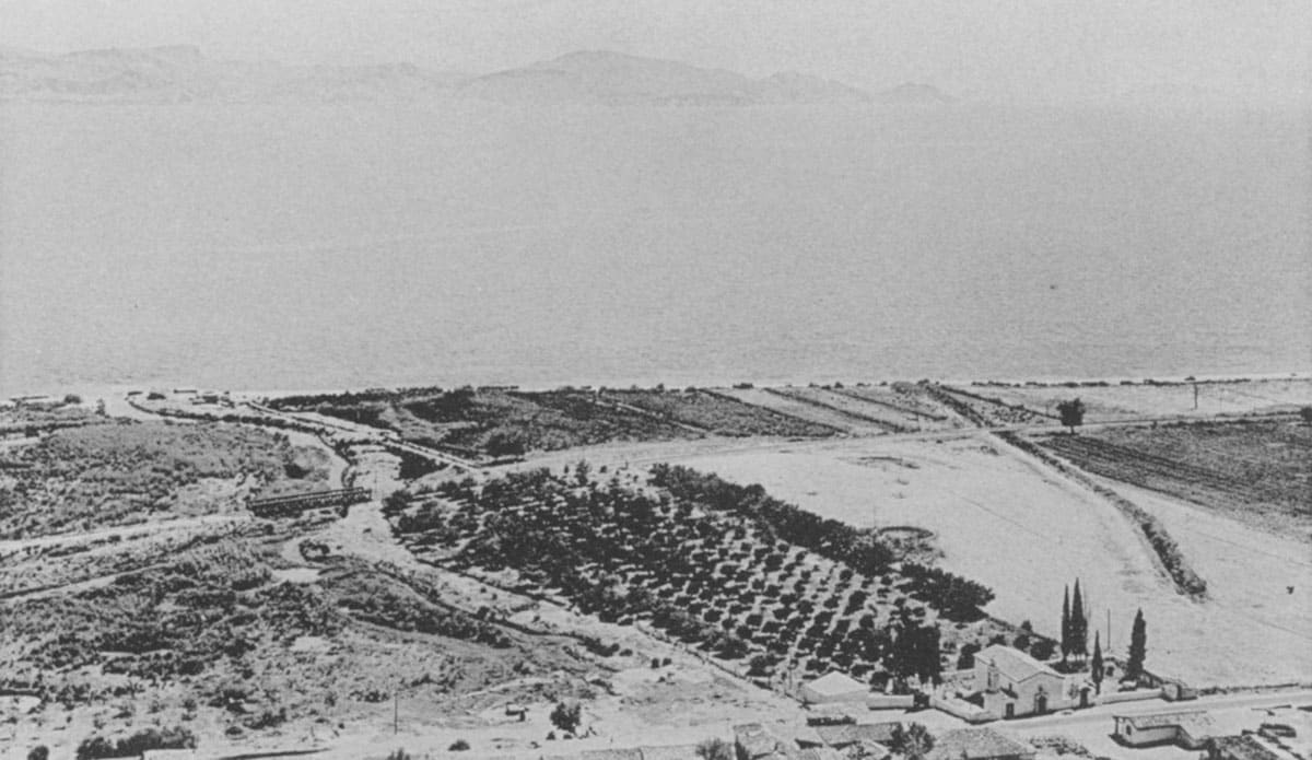 Black-and-white view from Mount Pontinos over the Lernaean marshes, the stream Amymone and the excavation site